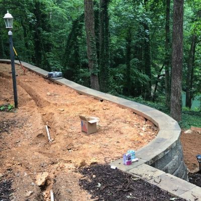 top of retaining wall in backyard cleared gainesville ga